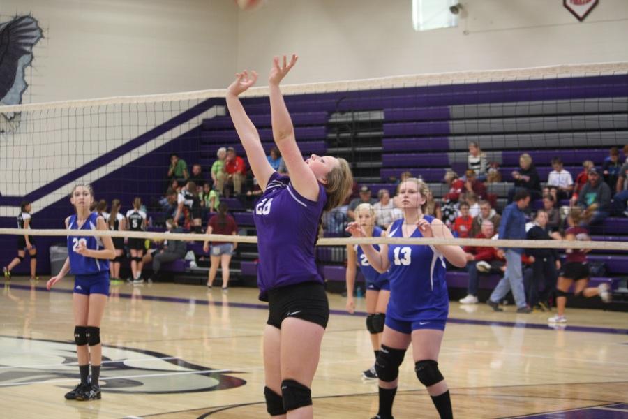 8th grader, Ryah Icenhower, sets the ball to a teammate.