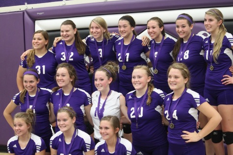 Pictured,  Eagle's JV Volleyball Team poses with First Place medals. 