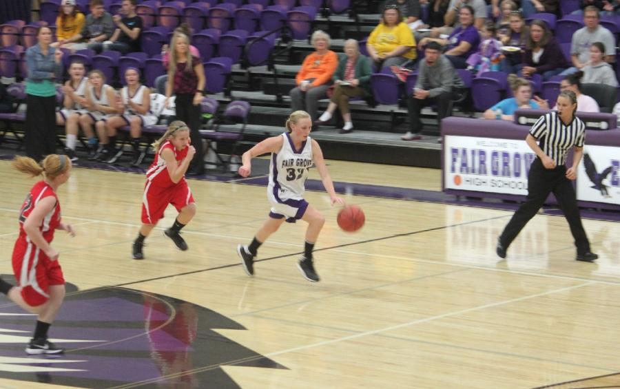 Gracie Rowden (8th) runs the fast break in a recent game.