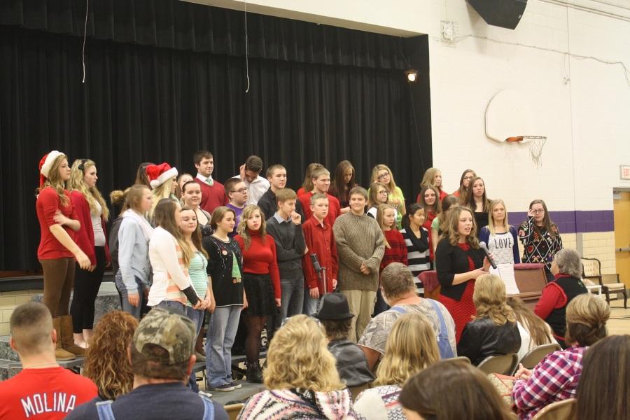 The choir sings at the play performance.
