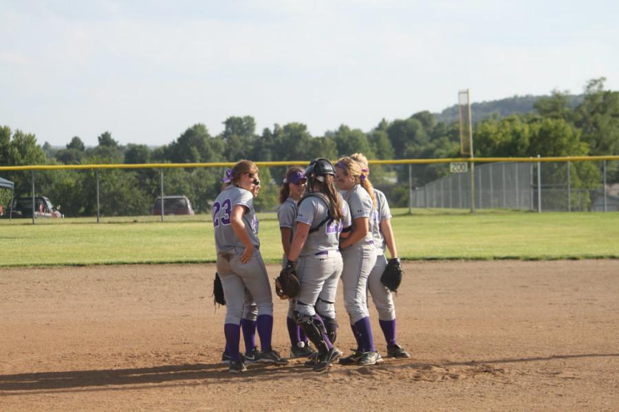 The Softball girls huddle up in a game last year. 