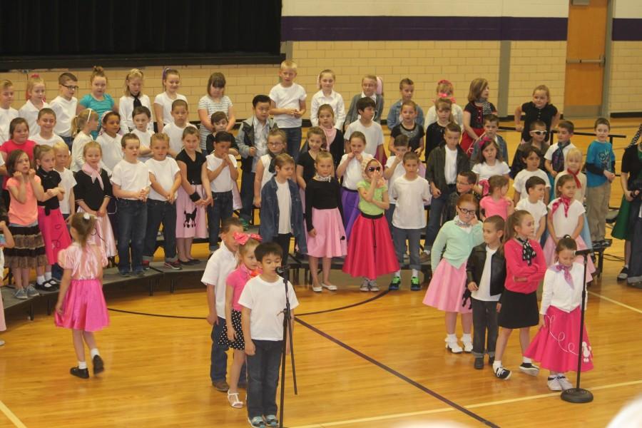 1st Graders performing in their 50s attire