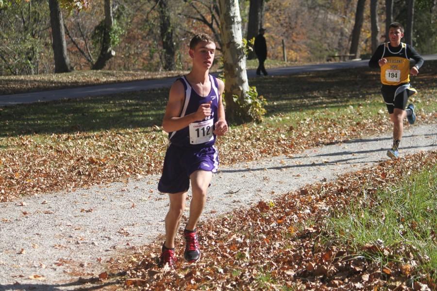 Cole Clark runs at Pomm De Terre Lake during the 2014-2015 Districts. 