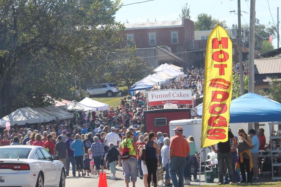 Thousands of people gather at the festival to eat and have fun. 