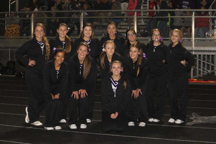 Fair Grove Cheerleaders perform at a home football game.