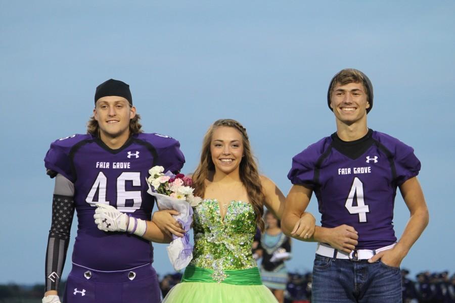 Homecoming Queen, Bailey Weaver, is escorted by seniors Kyle Colvard and Joe Caudle 
