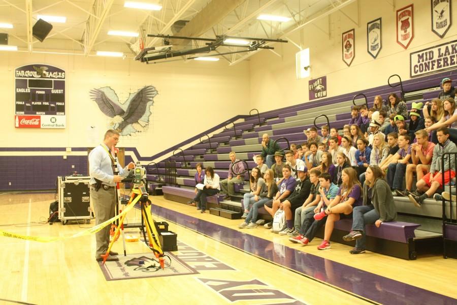  Neil Kastler spoke to middle school students on Career Day in the High School Gym. 
