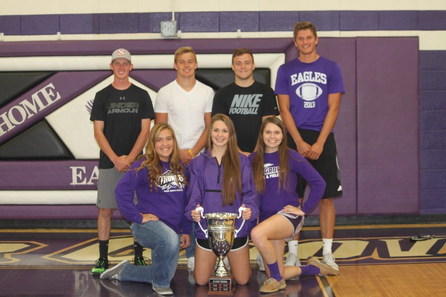 Senior athletes pose next to the MLC all-sports trophy that will remain at Fair Grove for the 2016-2017 school year.  
PHOTO BY CODY SISCO