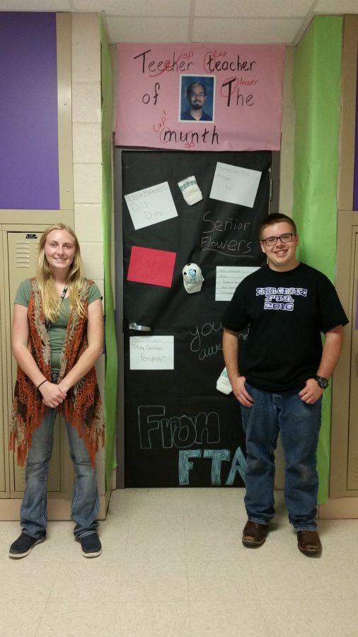Gracie Rowden, 10, and President Jacob Buckner, 11, pose in front of Mr. Florez’s FTA decorated door.
PHOTO PROVIDED BY
BETH MAULDIN 