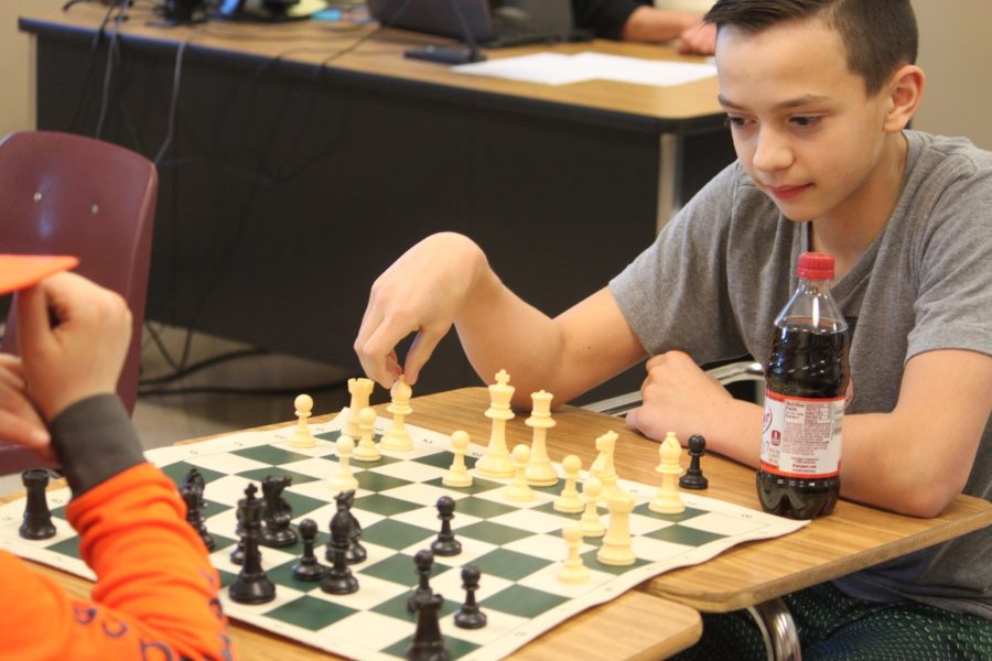 MS student plays against classmate
during a chess club meeting. 
PHOTO BY BRYSTOL BATES