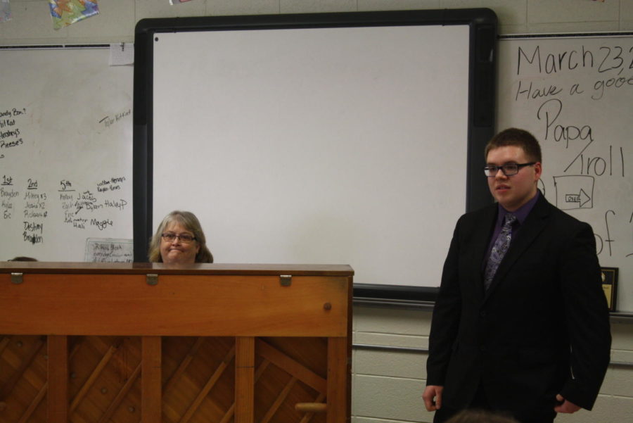 Elementary music teacher Mrs. Sparks and senior Jacob  Buckner