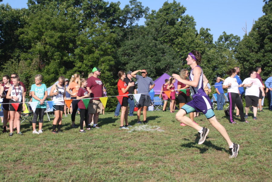 Ryan Odom sprints for the finish line