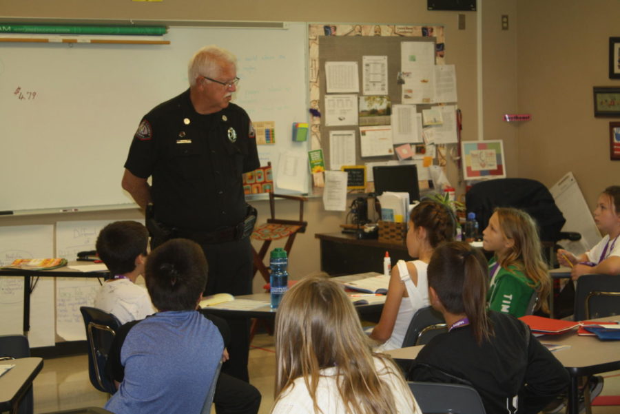 Officer Wagner talks with a class