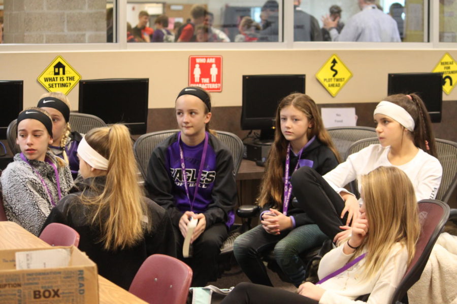 Middle school students listen during the TRUE meeting
