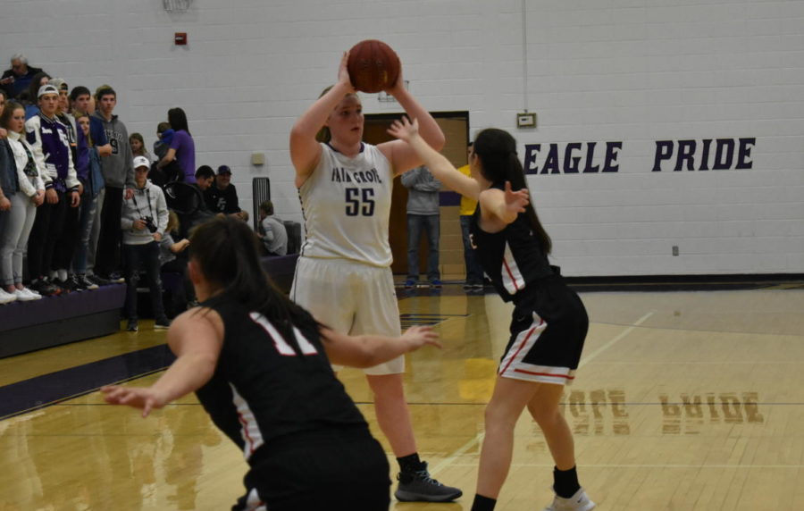 Senior Harley Maxwell, #55, looks for a pass.