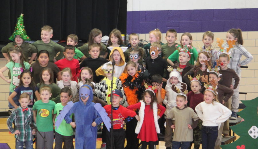 1st graders perform during their holiday program.