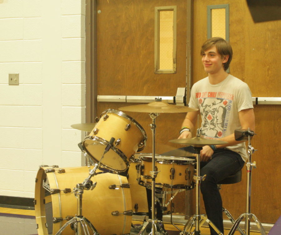 Mitch Van Cleave plays in the pep band at a home basketball game.