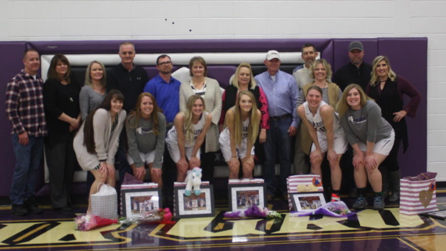 Girls Basketball Seniors pose on Senior Night