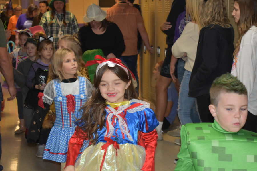 The elementary students showing their Halloween joy, through the High School
