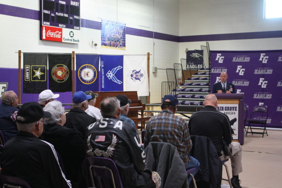 Speaker, Colonel Dan Semsel talking to the student body and the attending veterans