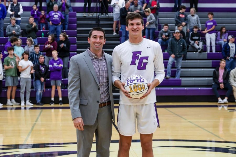 David Oplotnik and coach Cale Ramsey showing off Davids achievements