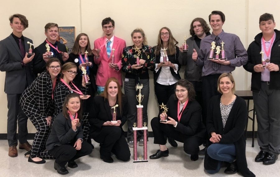 The Speech team celebrating their win at the Marion C. Early tournament