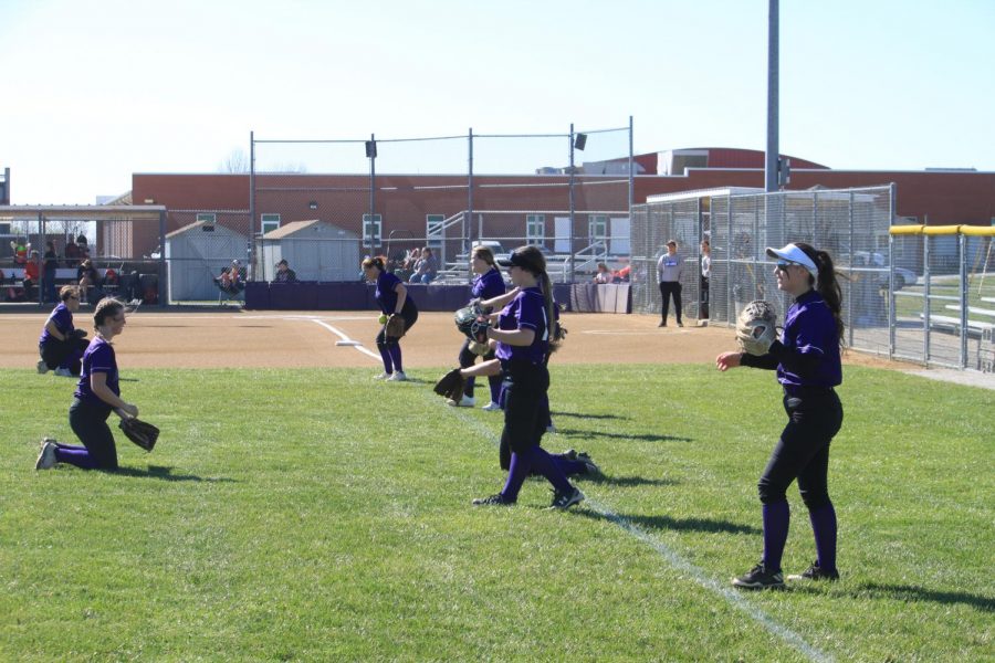 The softball team practicing after school.