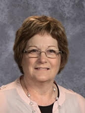 Ms. Pams last yearbook photo as the Elementary Secretary.