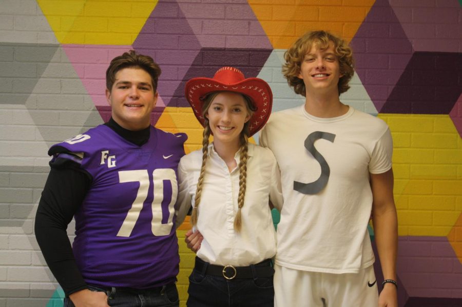 CREW board members Kyle Fritts(12), Macee Mcatee(12), and Devon Carroll(12) posing in front of a mural. (Board member Zoey Hupman (12) and sponsor Coach Buffington not pictured).