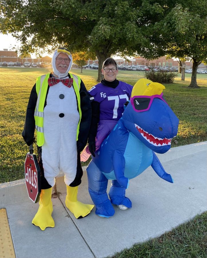 Mr. and Mrs. Downing coming to work at the cross walk dressed in costumes, photo provided by Mrs. Downing.
