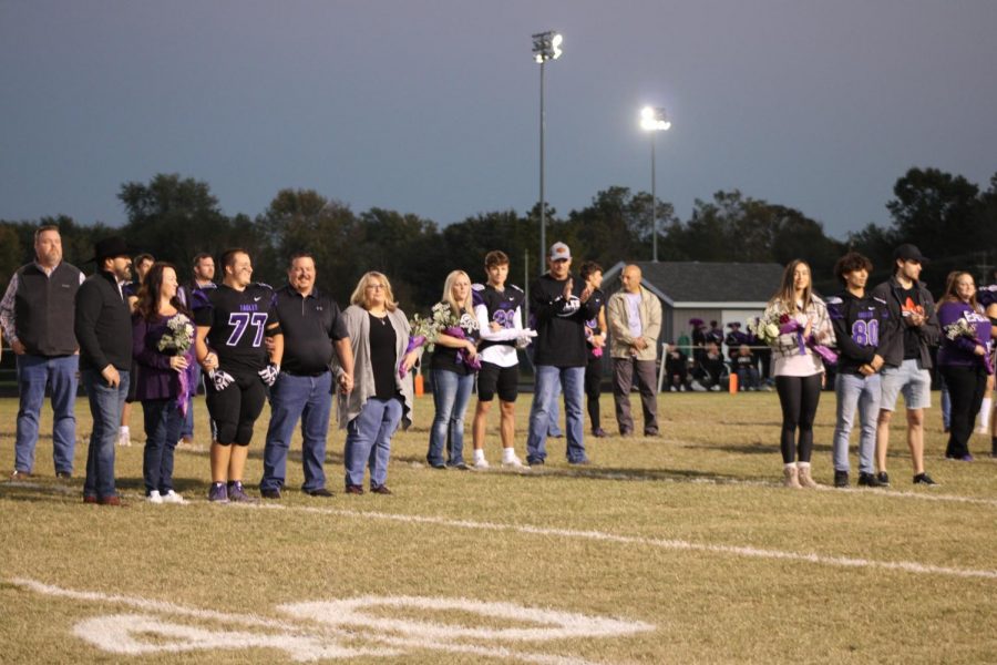 Senior football players with their escorts out on the field on Senior Night, October 22.
