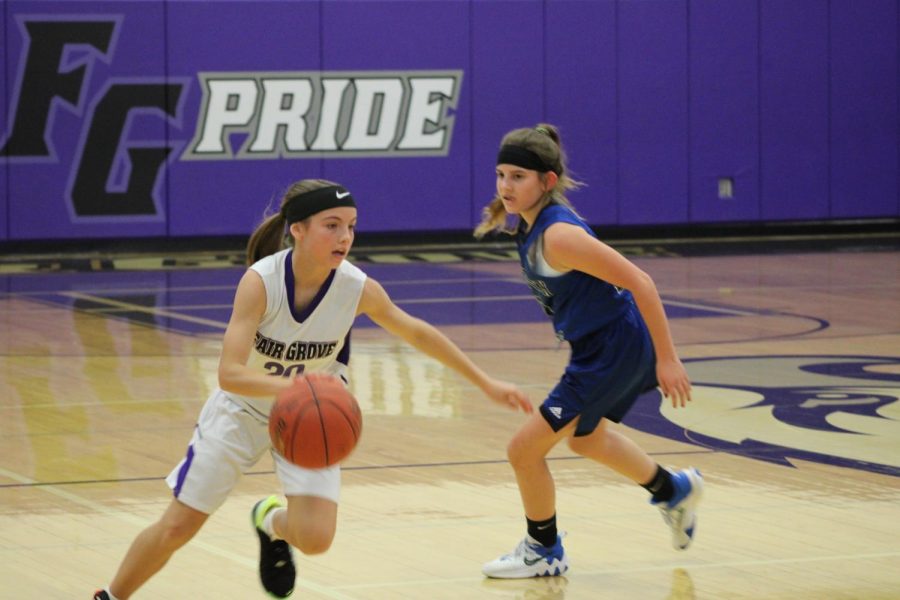 Sage Crowley, (7) Dribbling away after stealing the ball from a Lady Panther.