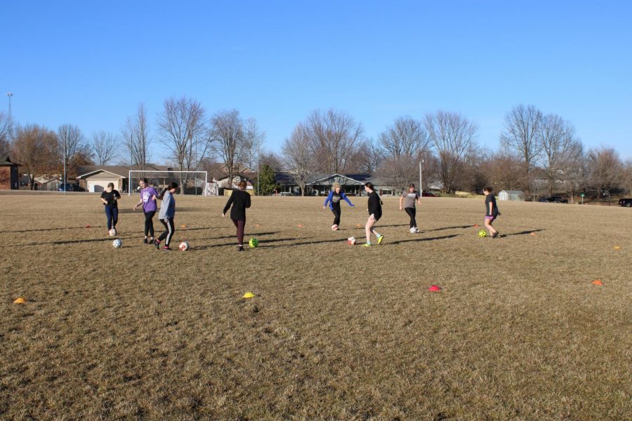 The 2020-2021 indoor girl's soccer team practicing pre-season. 