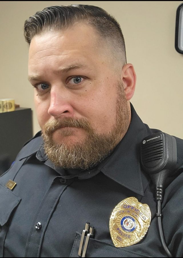 The most recent police picture that I have -Officer Bond.