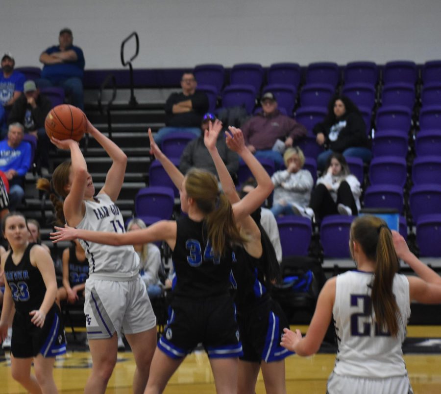 Sophomore Allison Findley shoots over her defenders against Clever on January 24th.
