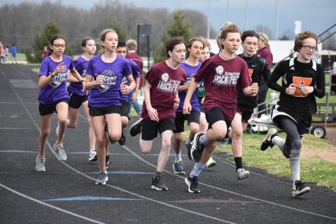 Middle School Track athletes (in purple from left to right: Catrina Cantwell, Lila Bell, Aleece Jackson, and David Turner) at Strafford Meet on 4/21. (Photo provided by Camille Boyer).