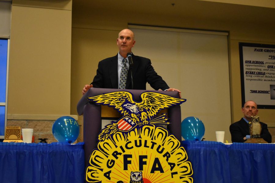 FFA advisor and agriculture teacher Matt Crutcher speaking at an FFA banquet. Photo provided by Fair Grove Newspaper.