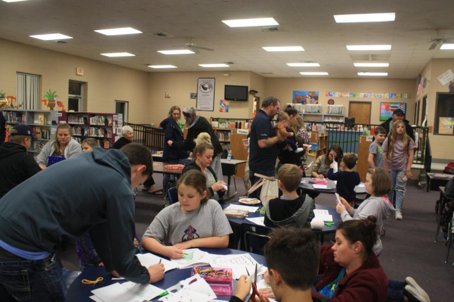Students and Parents talking among each other at the 2021 Winter Family Fun Night (photo provided by the FGS News Paper).