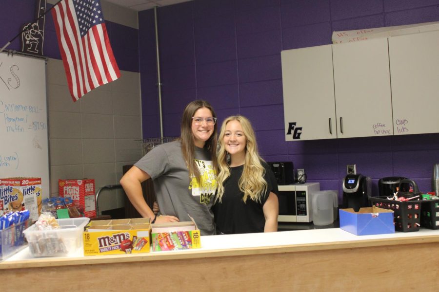 Lauren Thomlinson and Olivia Brumfield working the High School Coffee Shop. (Photo by Ivy Wehmeyer)
