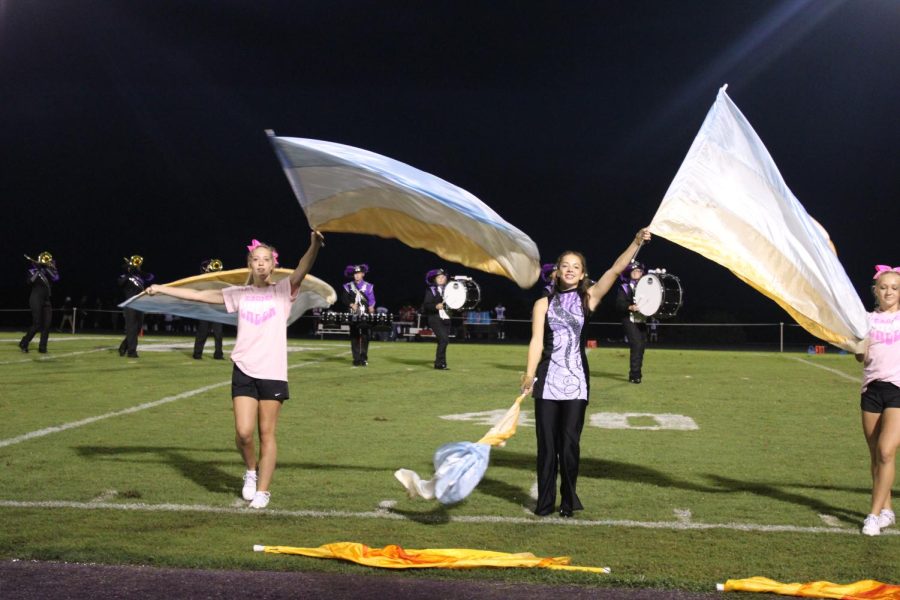 The color guard team performing at half-time at the football game on September 2nd, 2022. (Photo taken by Mattilee Wilson)