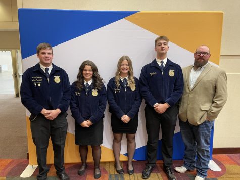 FFA contestants (left to right): Lucas Crutcher (2022 Graduate), Hannah Morris (12), Taylor Rode (12), Brett Sartin (12), and Mr. Johnson. (picture provided by Taylor Rode)