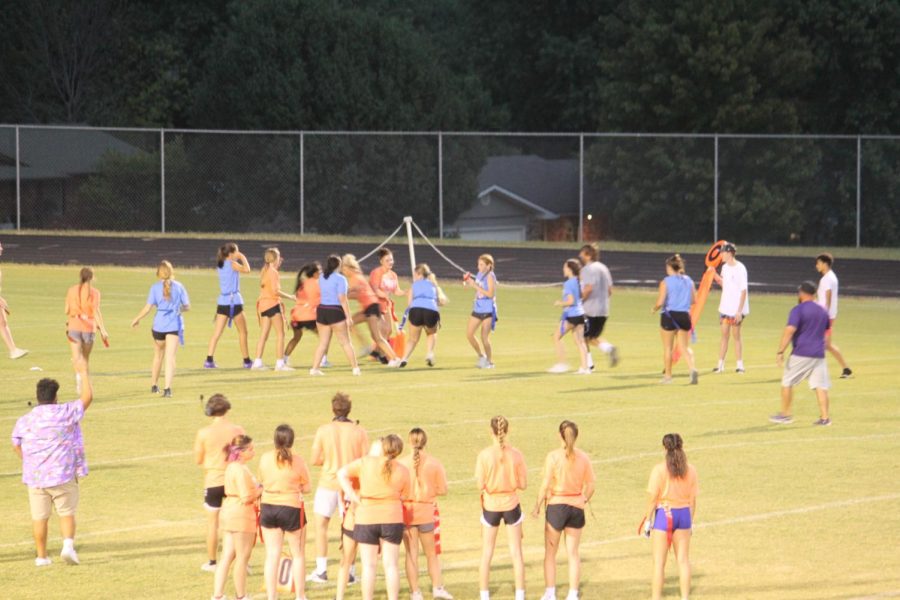 Team Cops (Blue) and team Robbers (Orange) during the powder puff game. (Photo taken by Baily Carll)