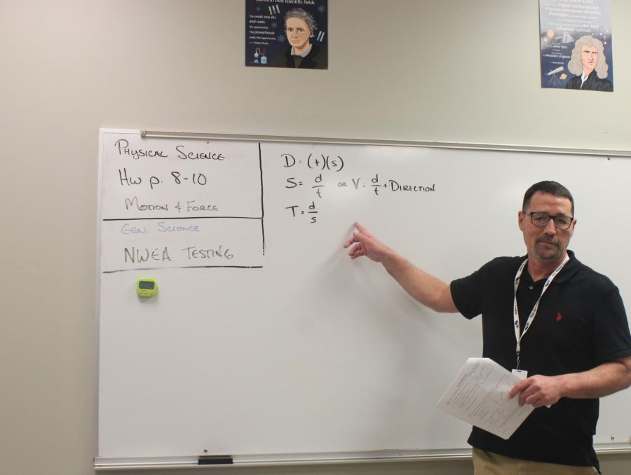 Mr. Matt Robertson teaching his Physical Science class. (photo taken by Piper Logan)