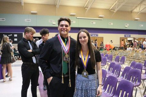 Kyle Frits and Zoey Hupman after recieving their Summa Cum Laude medals. In the back is Cooper Roy and Ken Peak.
(photo provided by Zoey Hupman)
