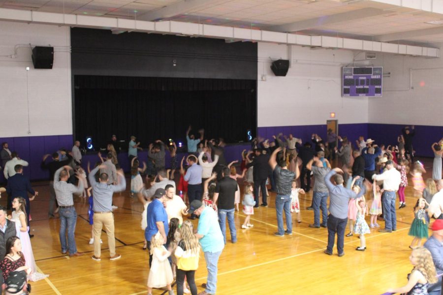 Daughters and their plus ones doing the YMCA at the 2023 PTO daughter spring fling. (photo taken by Riley Frazier)

