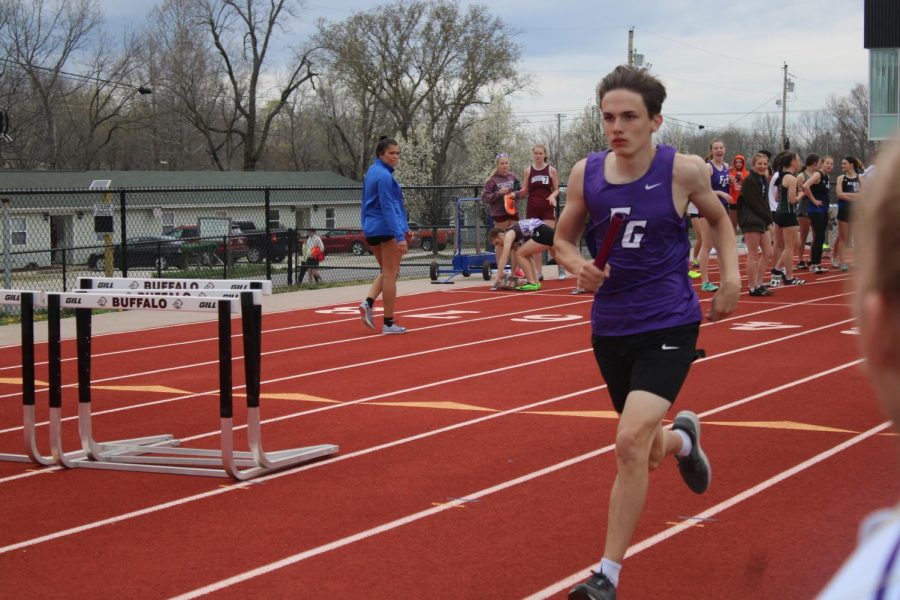 Jared Allen running in the 4x800 meter relay at the Buffalo track meet on March 28th. (photo taken by Piper Logan)