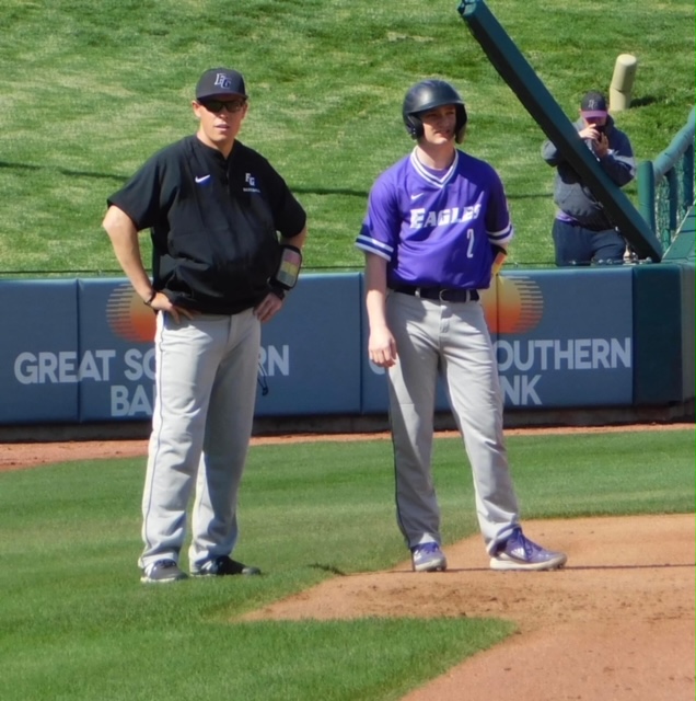 Coach William Reed next to player Carson Krider. (photo provided by Lessa Taylor)
