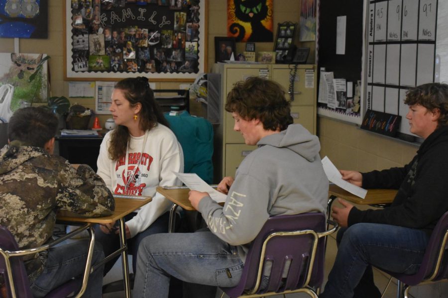 Mrs. Feldman helping Garret Hargus and Tony Lassley in her 8th hour. (photo taken by Jena Scaletty)