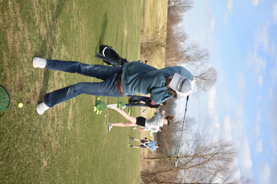 Haydn Hall (12) practicing his golf swing. (photo provided by 2021 FGS Newspaper staff)