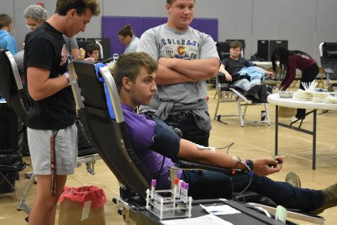 Mason Koller (11) donating while Oakland Wayne Morrison (11) keeps him company. (photo taken by Baily Carll)
